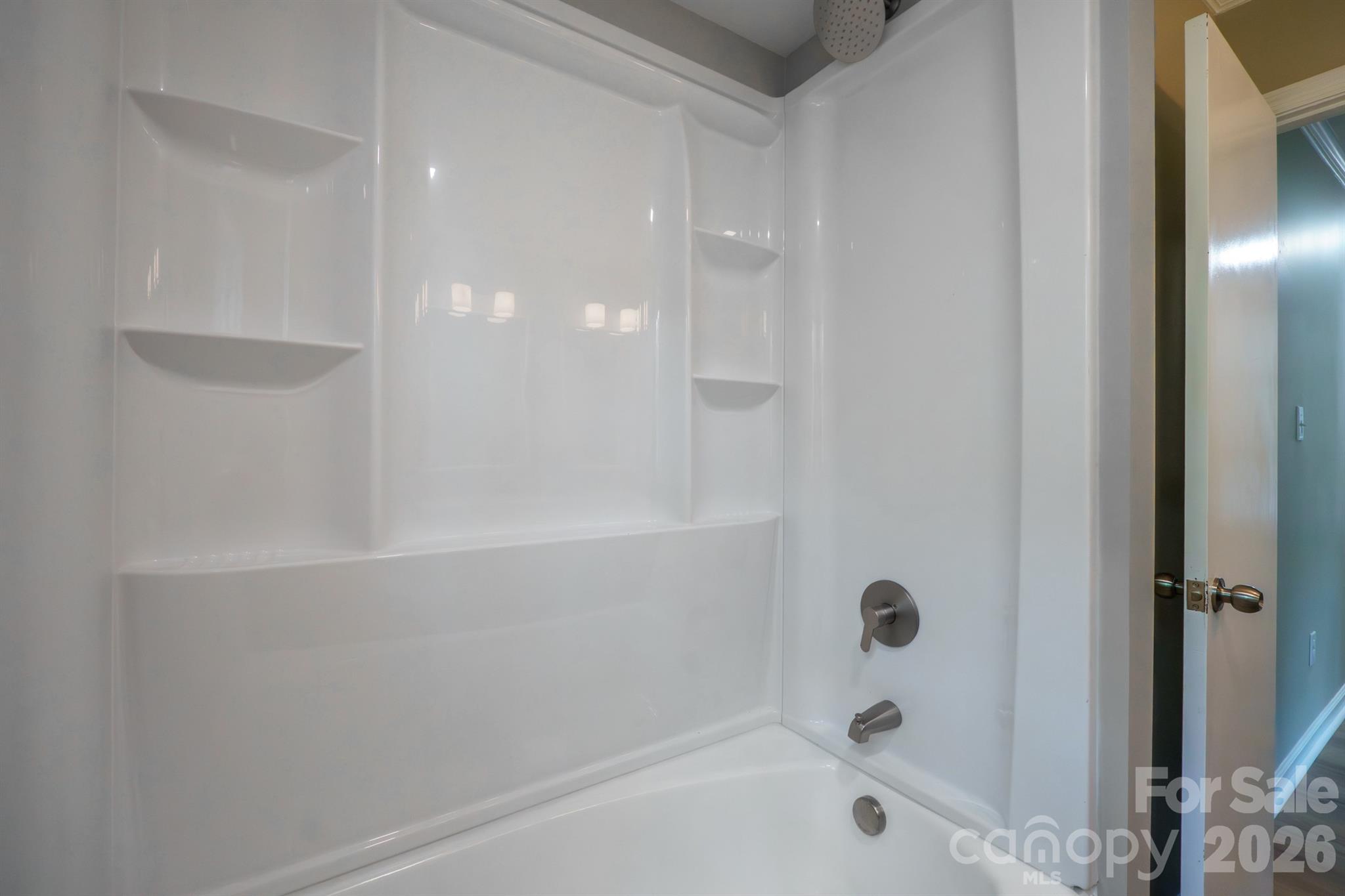 624 Flicker Street Concord, NC 28027 - Photo 41 of 47 a bathroom with a bathtub