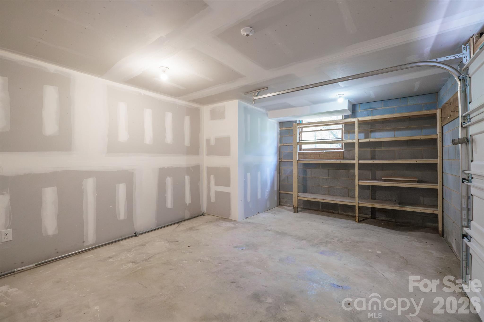 624 Flicker Street Concord, NC 28027 - Photo 42 of 47 a view of an empty room with a fireplace