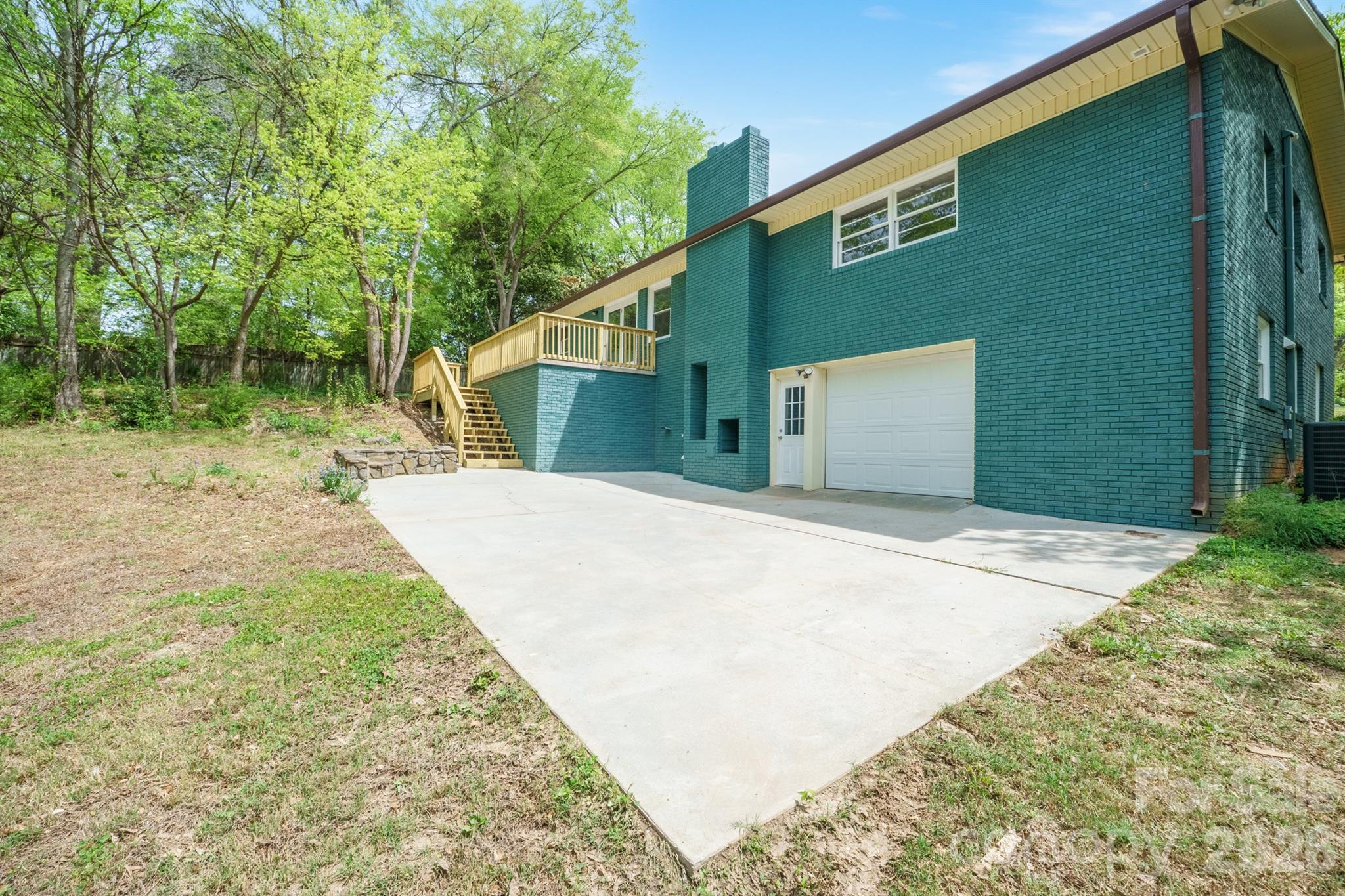624 Flicker Street Concord, NC 28027 - Photo 45 of 47 a front view of a house with a yard