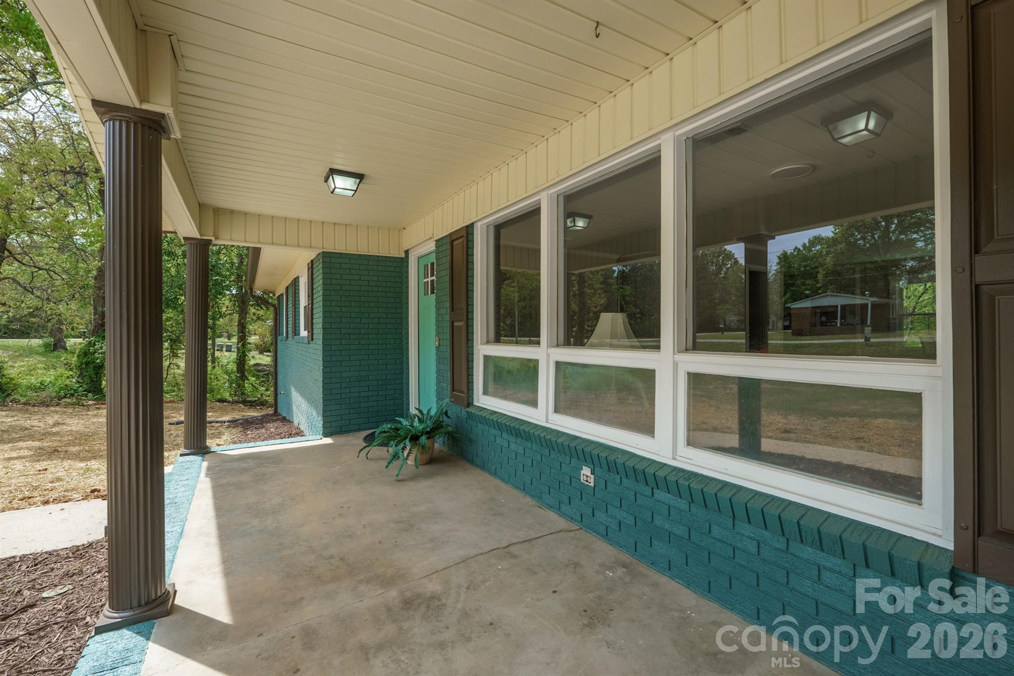 624 Flicker Street Concord, NC 28027 - Photo 5 of 47 a house view with a garden space