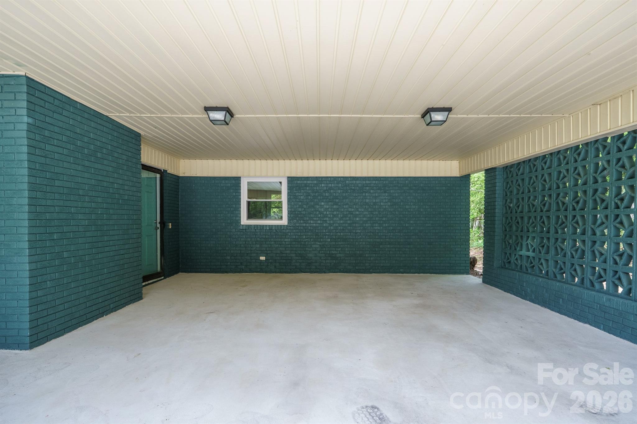624 Flicker Street Concord, NC 28027 - Photo 6 of 47 a view of an empty room with a window