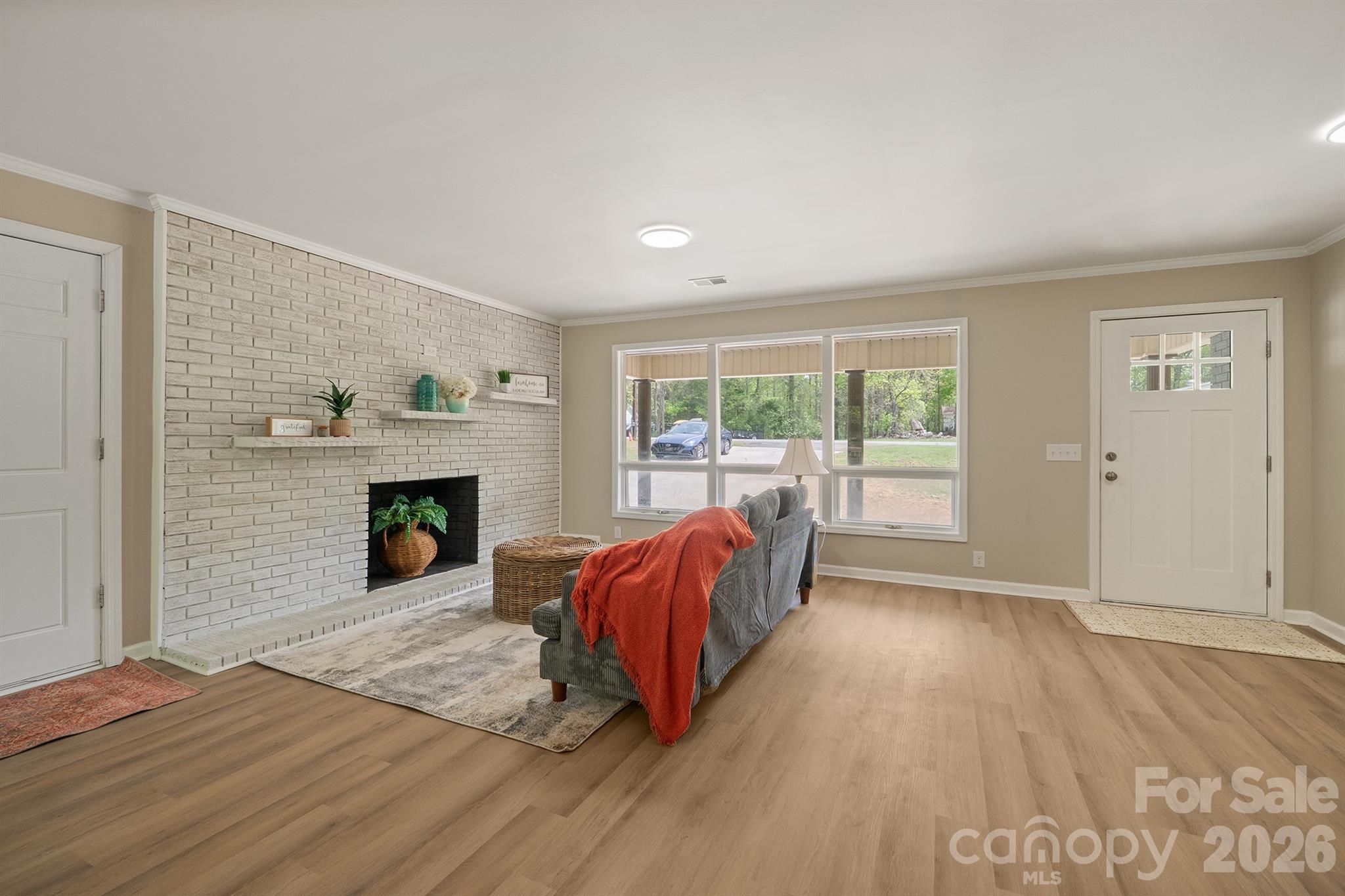 624 Flicker Street Concord, NC 28027 - Photo 8 of 47 a view of livingroom with furniture and fireplace