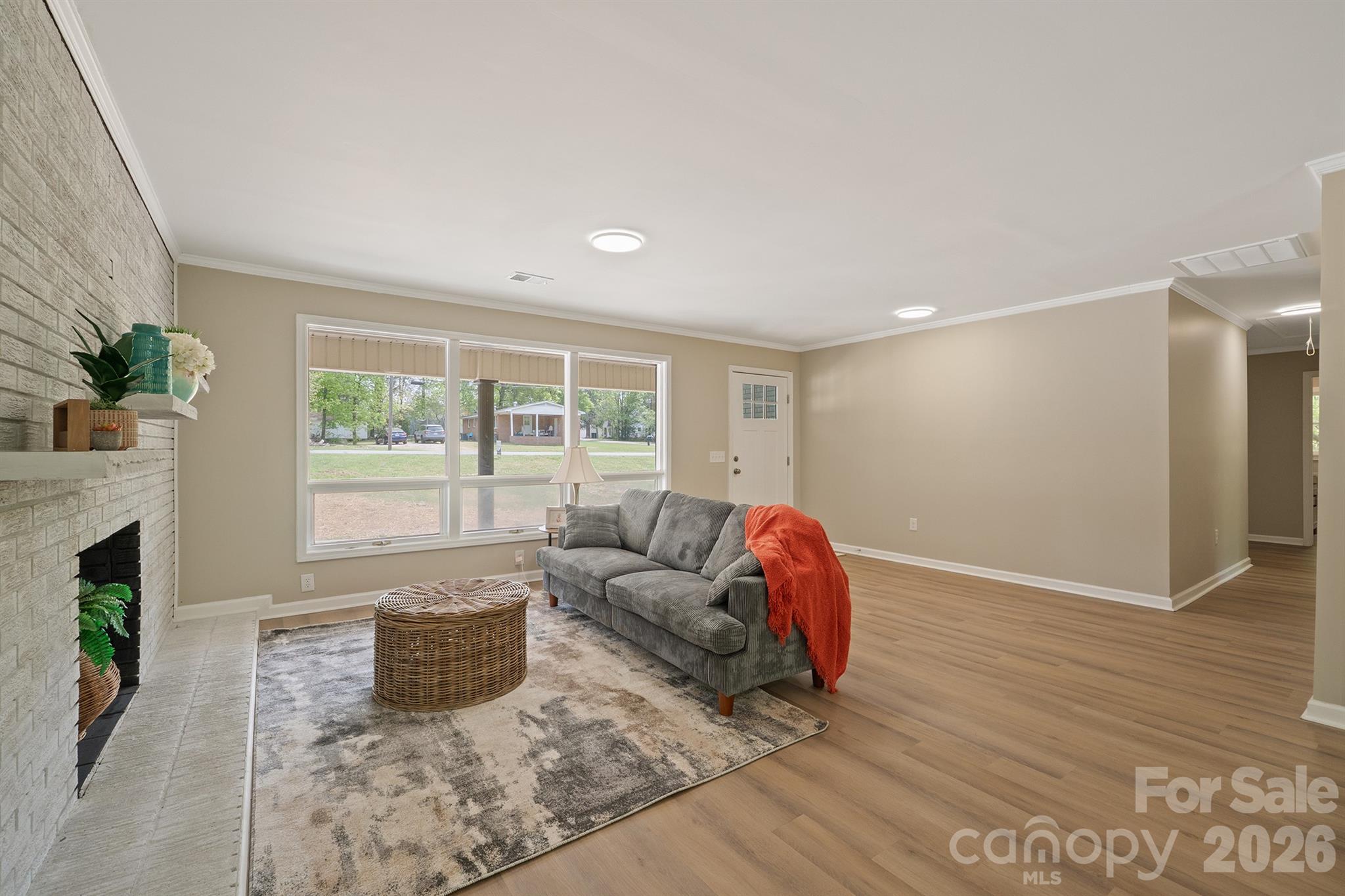 624 Flicker Street Concord, NC 28027 - Photo 9 of 47 a living room with furniture and a fireplace