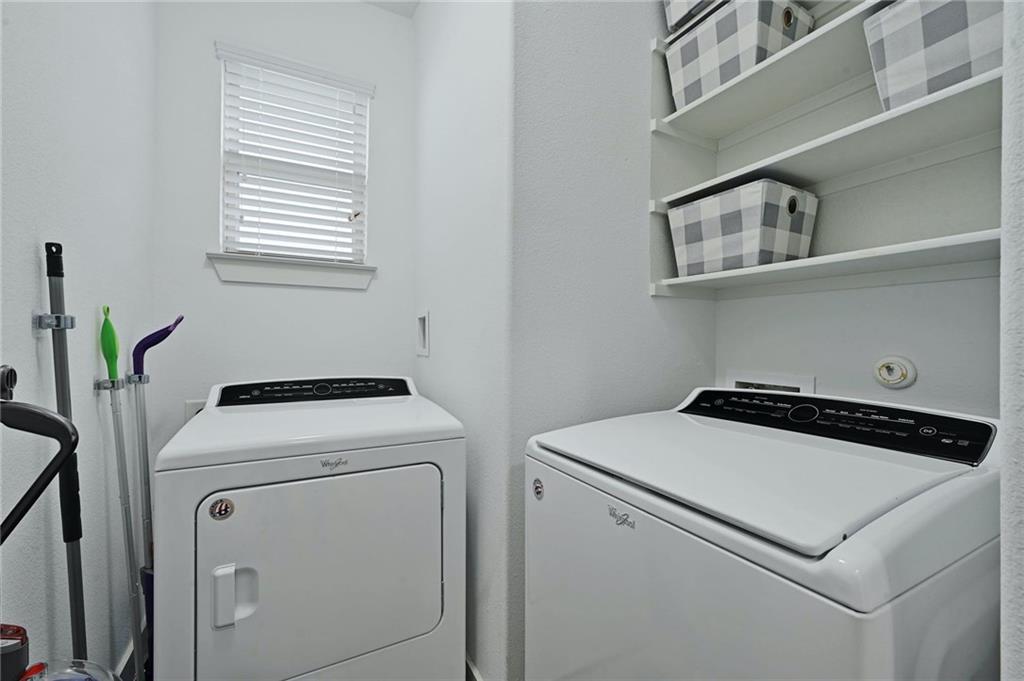 1007 Totis Road Austin, TX 78748 - Photo 20 of 37 a utility room with dryer and washer