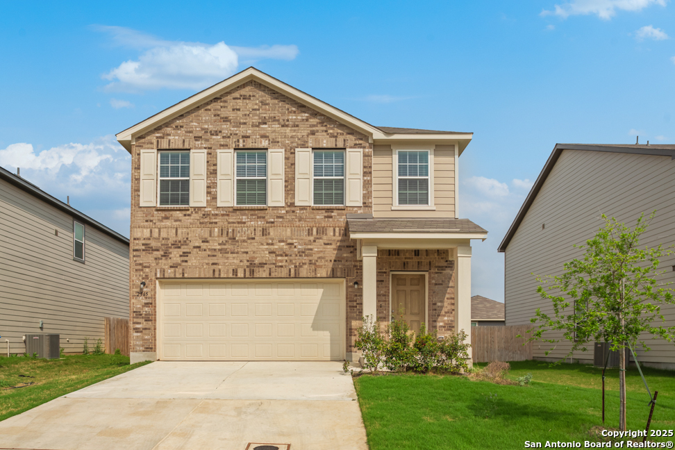 2565 Windle Lane Seguin, TX 78155 - Photo 1 of 1 a front view of a house with garden
