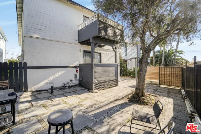 a house with trees in front of it