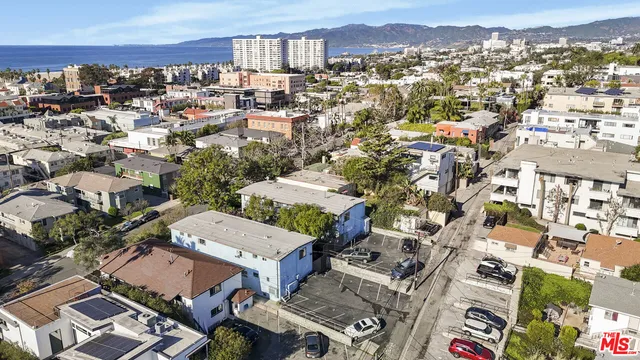 an aerial view of a city with lots of residential buildings