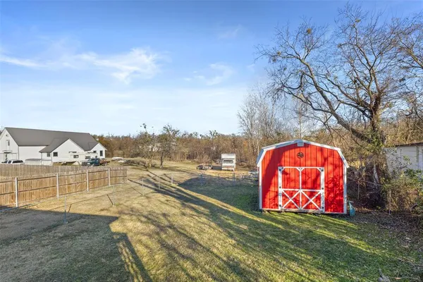 a view of swimming pool with a yard