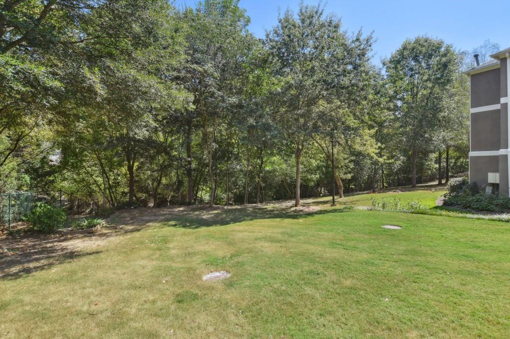 19 Normandy Court Atlanta, GA 30324 - Photo 27 of 27 a view of a backyard with large trees