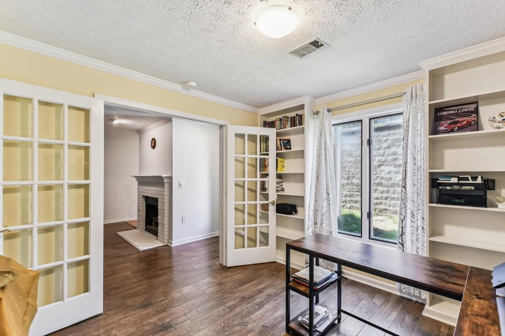 19 Normandy Court Atlanta, GA 30324 - Photo 6 of 27 a view of a livingroom with furniture and wooden floor