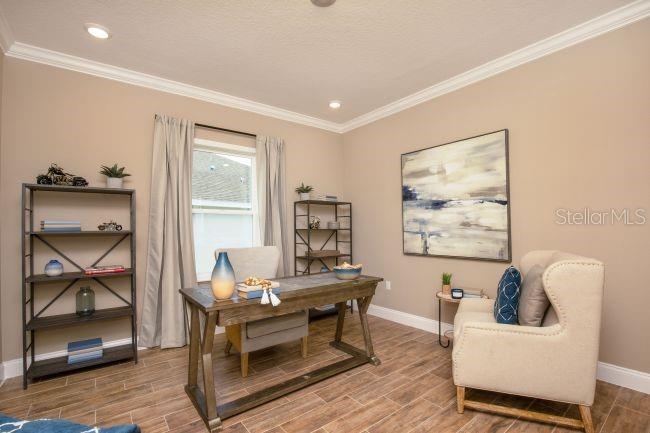 16492 Crane Road Weeki Wachee, FL 34614 - Photo 9 of 24 a living room with furniture and a window