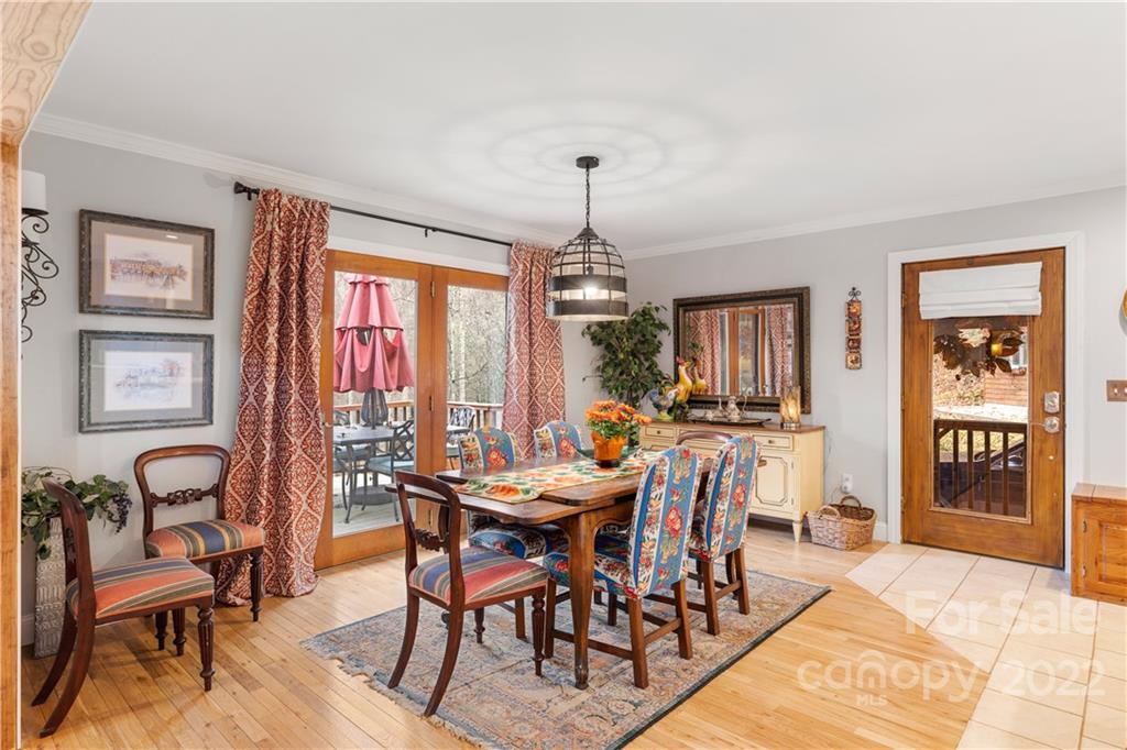 80 Lick Log Road Sylva, NC 28779 - Photo 6 of 25 a view of a dining room with furniture window and outside view