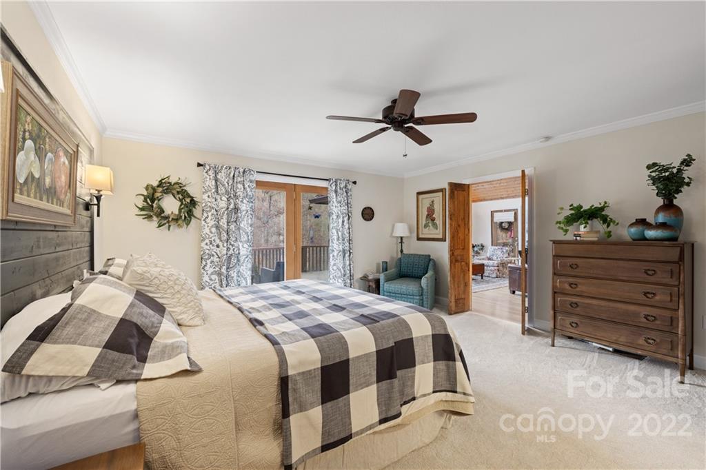 80 Lick Log Road Sylva, NC 28779 - Photo 10 of 25 a bedroom with a bed and a dresser