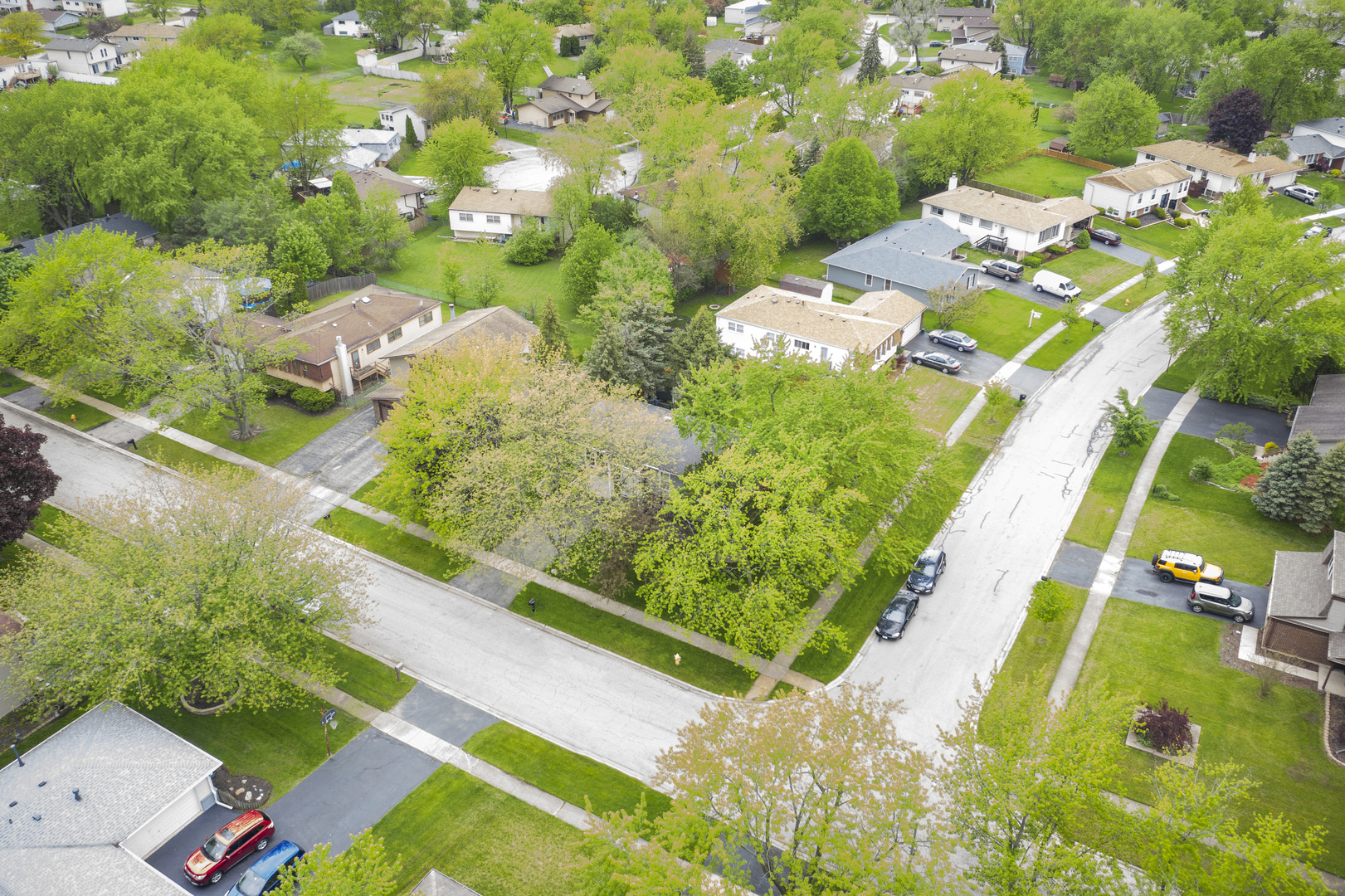 450 Galahad Road Bolingbrook, IL 60440 - Photo 22 of 23 an aerial view of a house with a yard and lake view