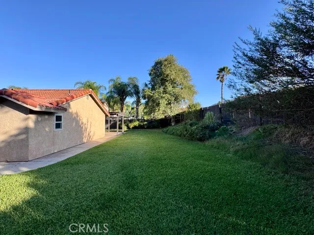 a view of a garden with a pathway