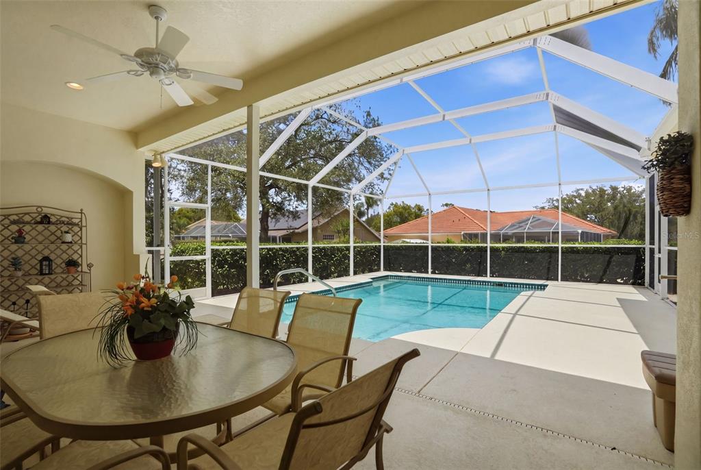 7221 Aloe Drive Spring Hill, FL 34607 - Photo 26 of 34 a view of a dining room with furniture window and outside view