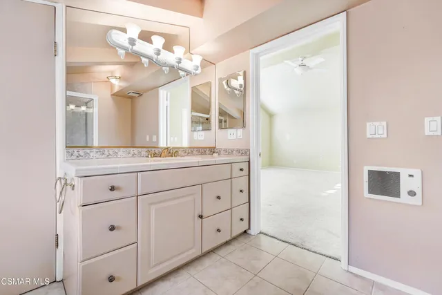 a bathroom with a bathtub and a toilet