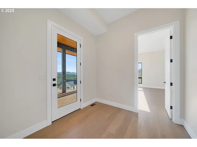 a bathroom with a sink granite tub toilet and shower