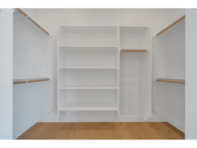 a view of balcony with wooden floor
