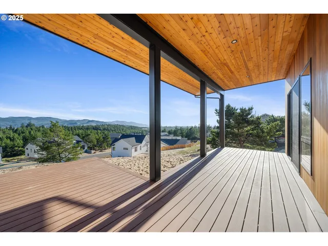 a bathroom with a sink double vanity granite and a mirror