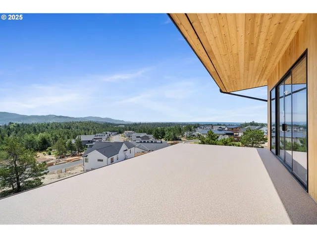 a view of a terrace with a garden