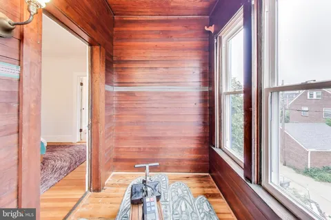 a spacious bedroom with a bed and a window