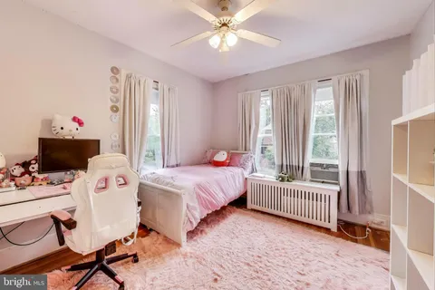 a bathroom with a shower a bathtub and a shower