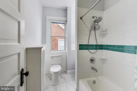 a view of a workspace with furniture and toys