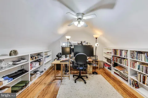 a view of a room with wooden walls