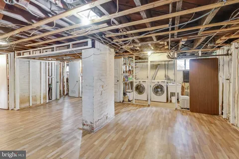 a balcony with wooden floor and outdoor space