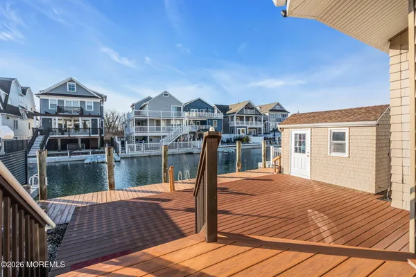 a outdoor view of a house with lake view