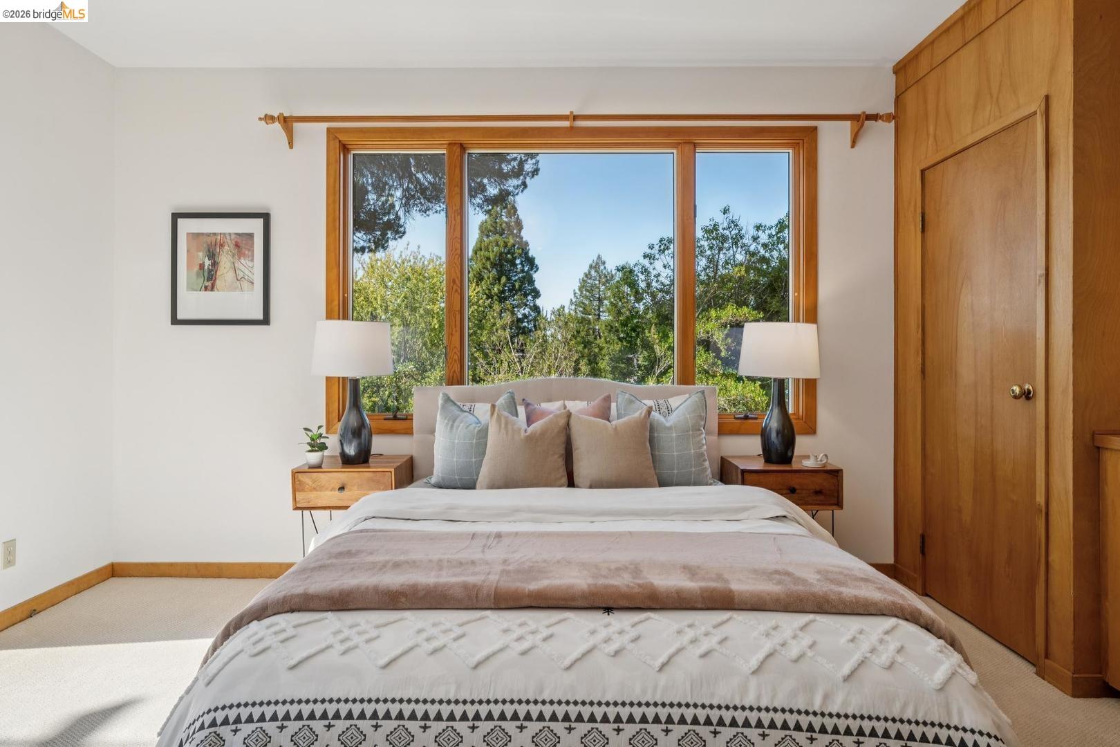 155 Avenida Drive Berkeley, CA 94708 - Photo 53 of 86 Expansive window with natural wood trim, light-colored walls, and carpeting