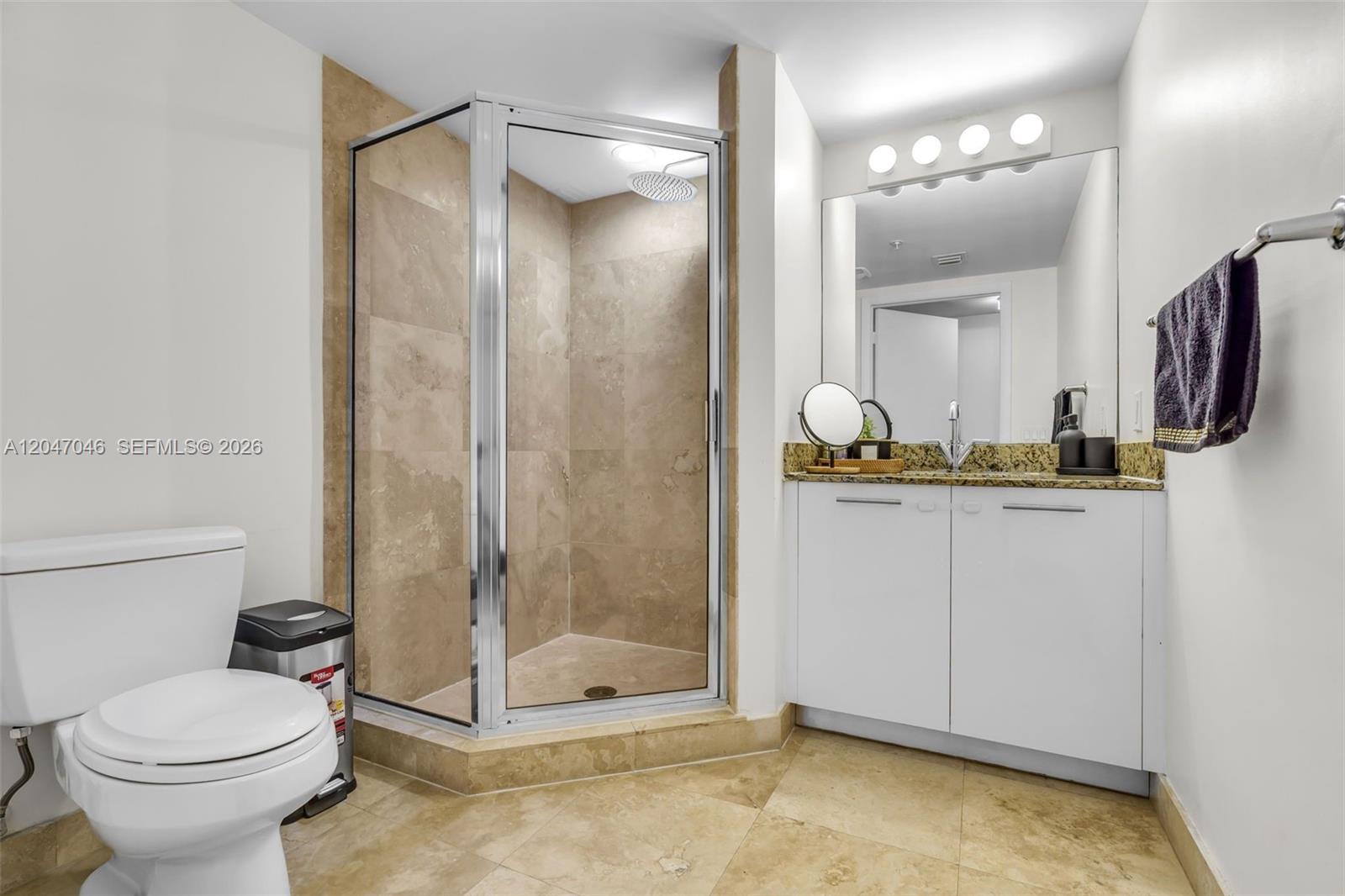 41 Southeast 5th Street, Unit 908 Miami, FL 33131 - Photo 6 of 26 Downstairs bathroom