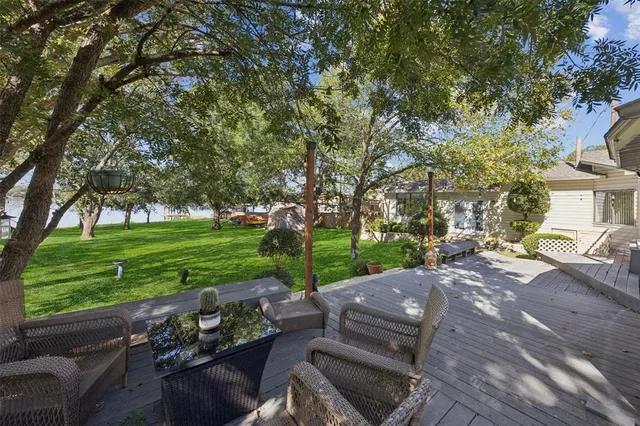 a view of a two chairs in a yard