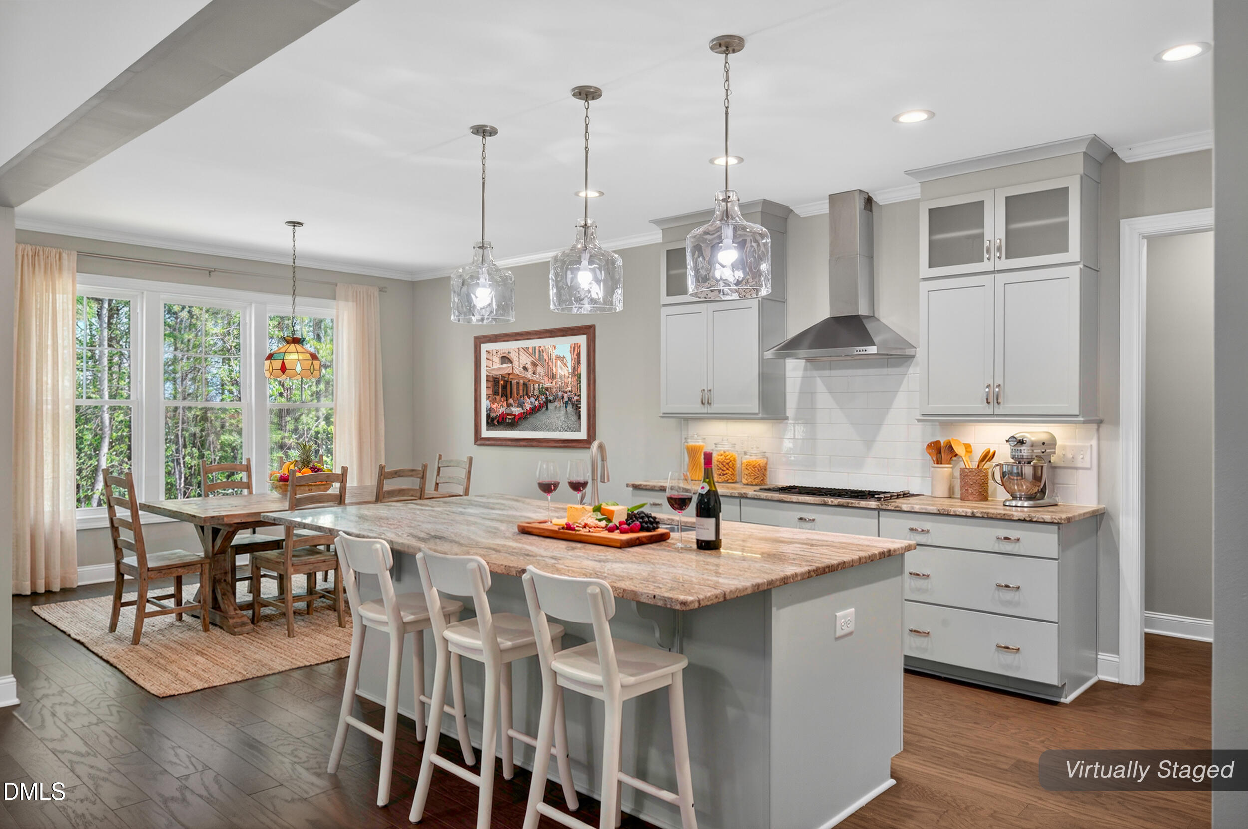 231 High Ridge Lane Pittsboro, NC 27312 - Photo 5 of 47 a kitchen with stainless steel appliances granite countertop a stove a sink dishwasher a dining table and chairs with wooden floor