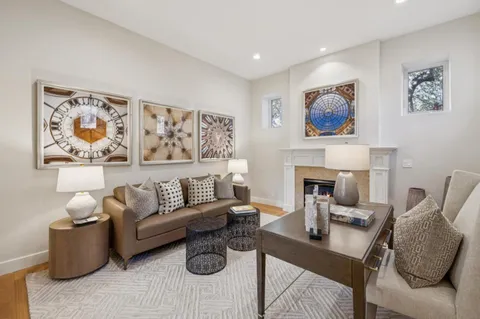 a spacious bedroom with a large bed and a couch