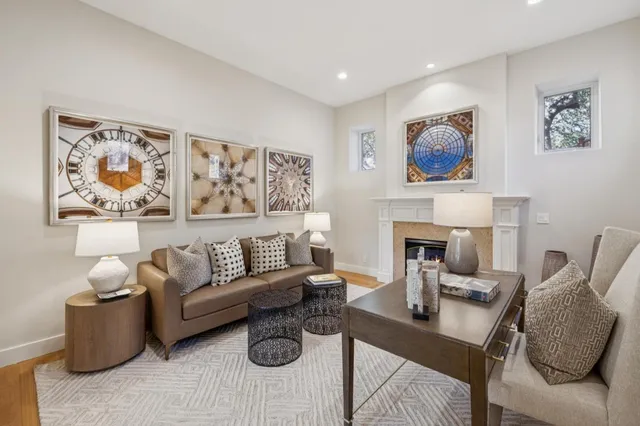 a spacious bedroom with a large bed and a couch