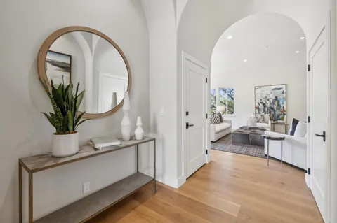 a front view of a house with table and chairs