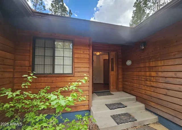 a view of a pathway besides a house