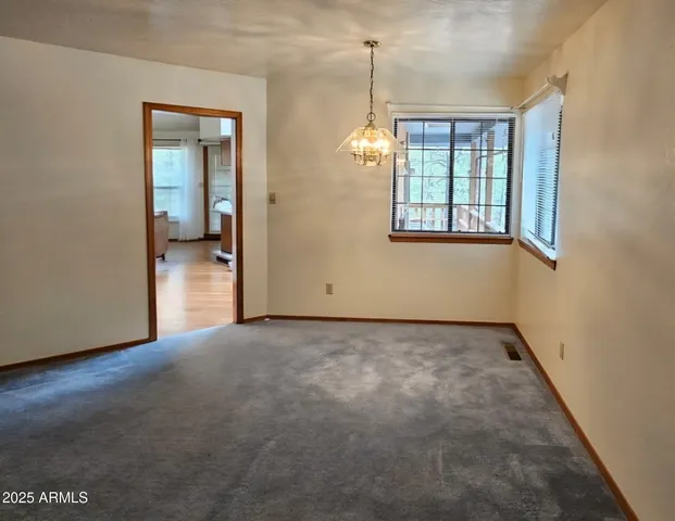 an empty room that has a window