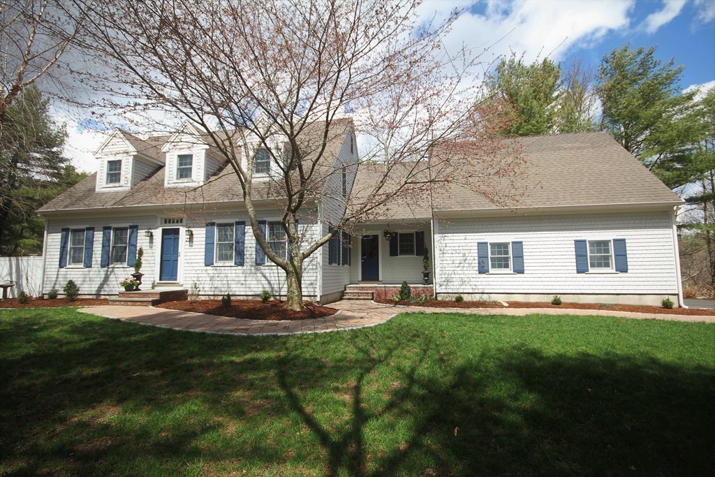 23 Hiller Road Rochester, MA 02770 - Photo 28 of 30 a front view of a house with a garden