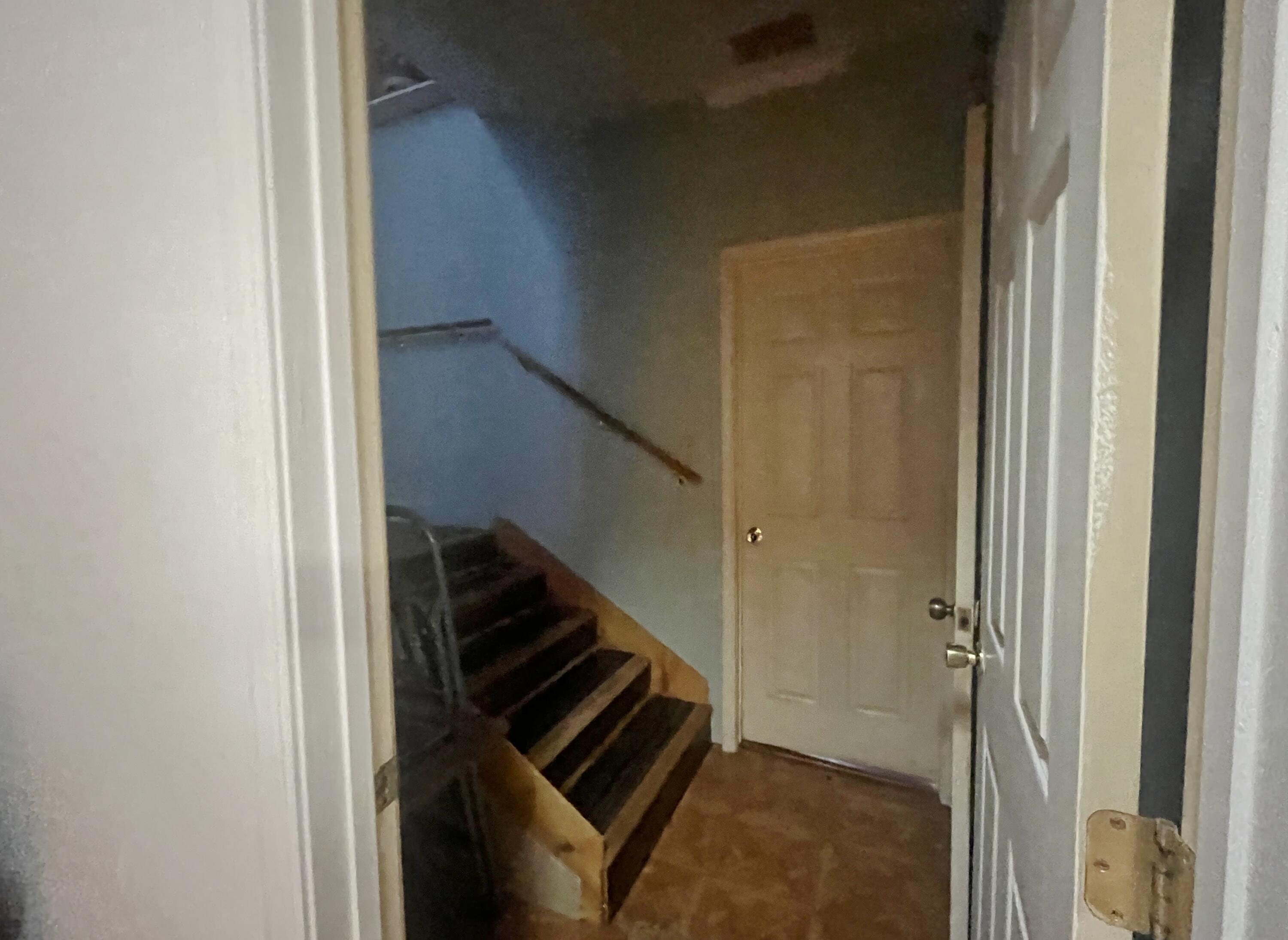 58 Hankins Road Freeport, FL 32439 - Photo 12 of 29 a view of hallway with stairs