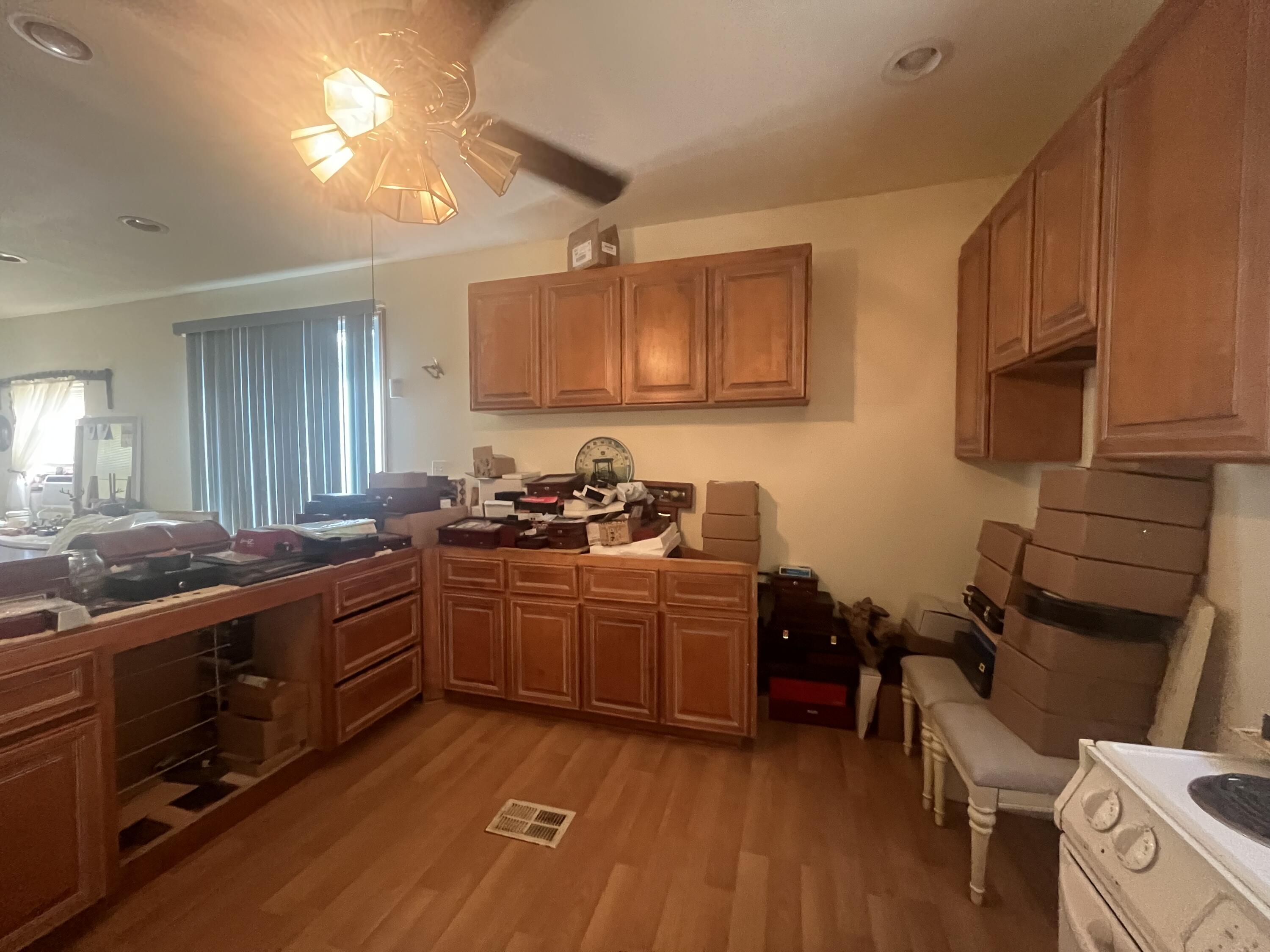 58 Hankins Road Freeport, FL 32439 - Photo 13 of 29 a kitchen with stainless steel appliances granite countertop a sink stove and cabinets