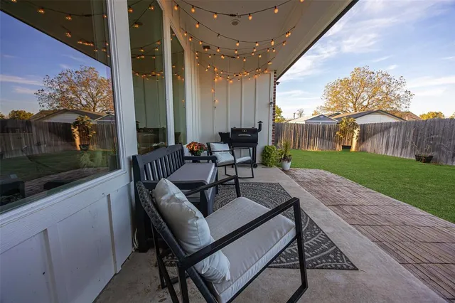 a building outdoor space with patio furniture and entertaining space