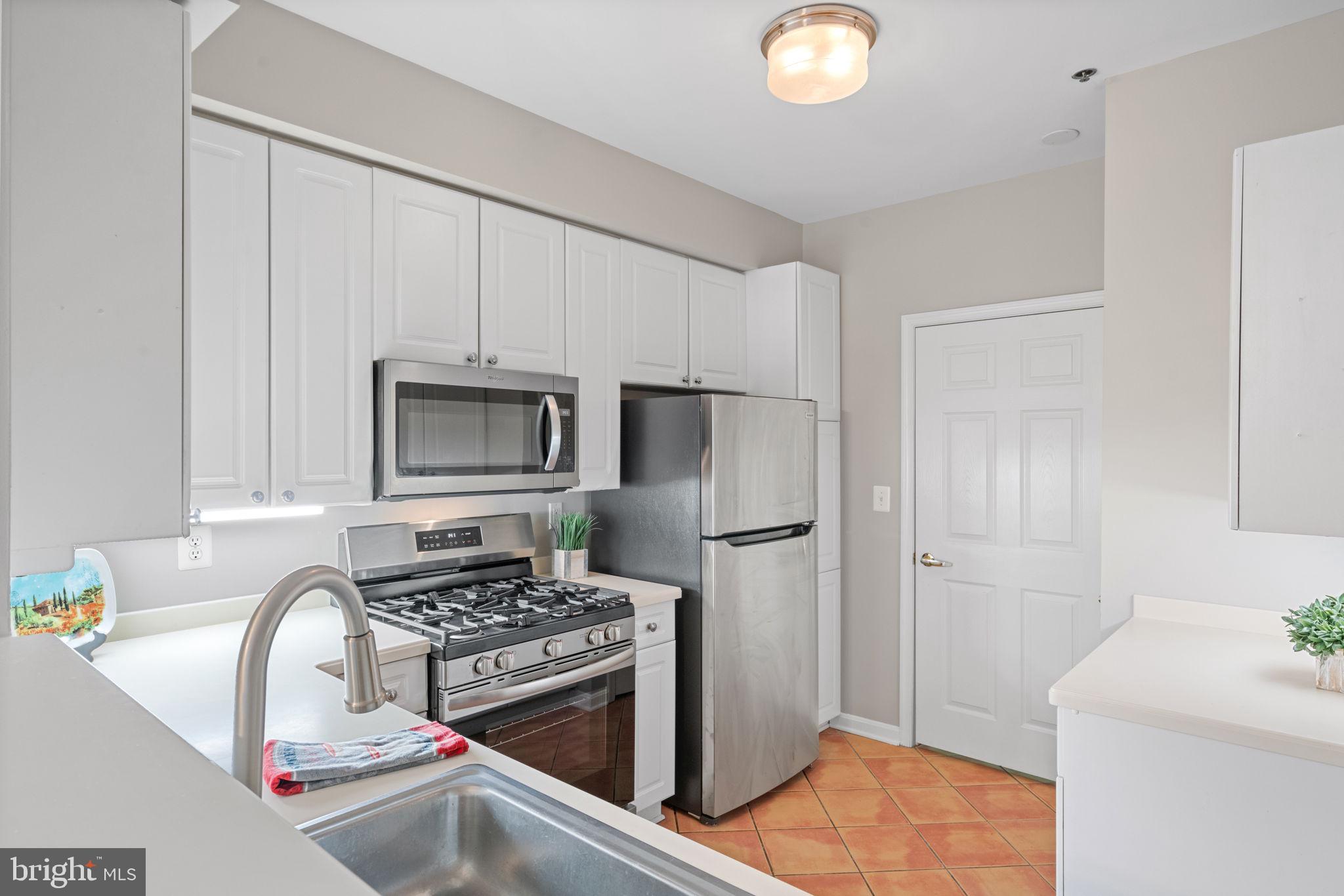 1860 Stratford Park Place, Unit 305 Reston, VA 20190 - Photo 18 of 35 New Refrigerator, Built-in Microwave, Dishwasher