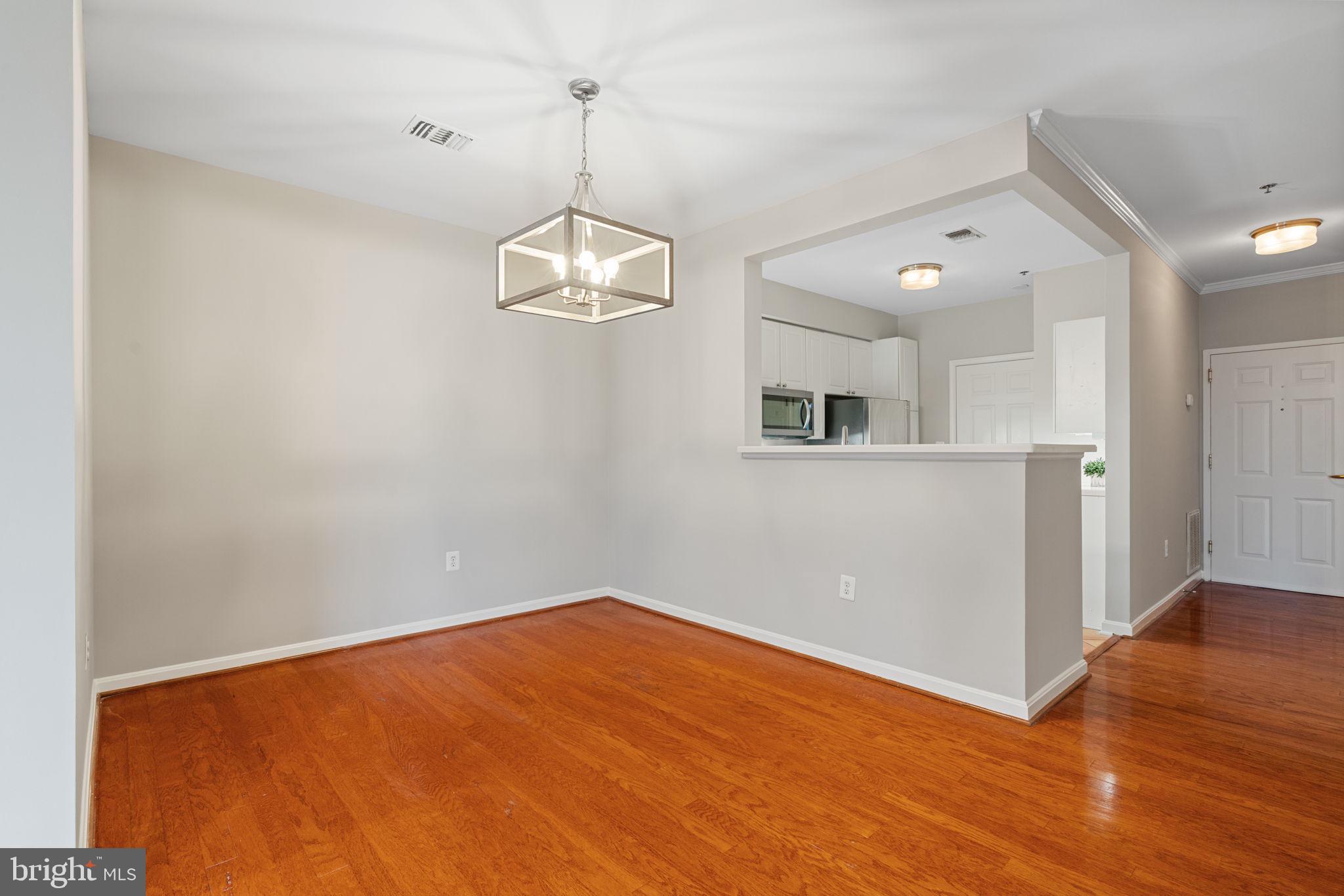 1860 Stratford Park Place, Unit 305 Reston, VA 20190 - Photo 23 of 35 Dining Room Area with Hardwod floors