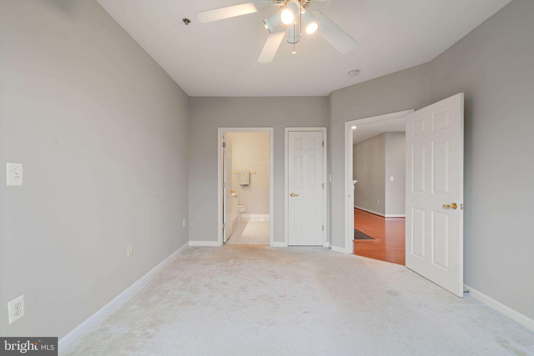 1860 Stratford Park Place, Unit 305 Reston, VA 20190 - Photo 28 of 35 Primary Bedroom with Ensuite