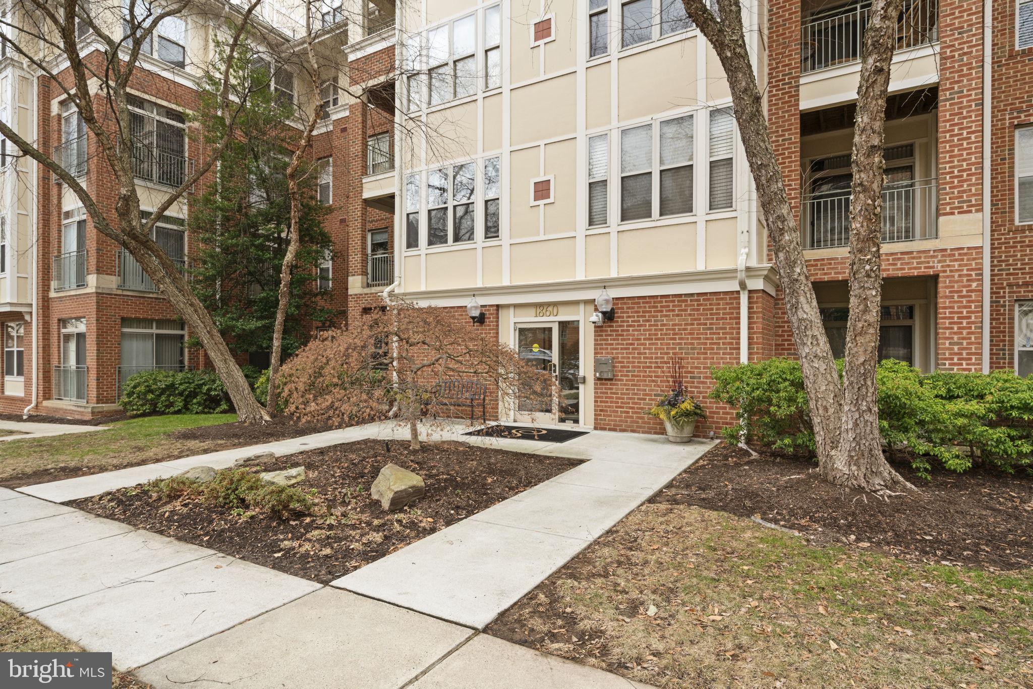 1860 Stratford Park Place, Unit 305 Reston, VA 20190 - Photo 5 of 35 Back Entrance