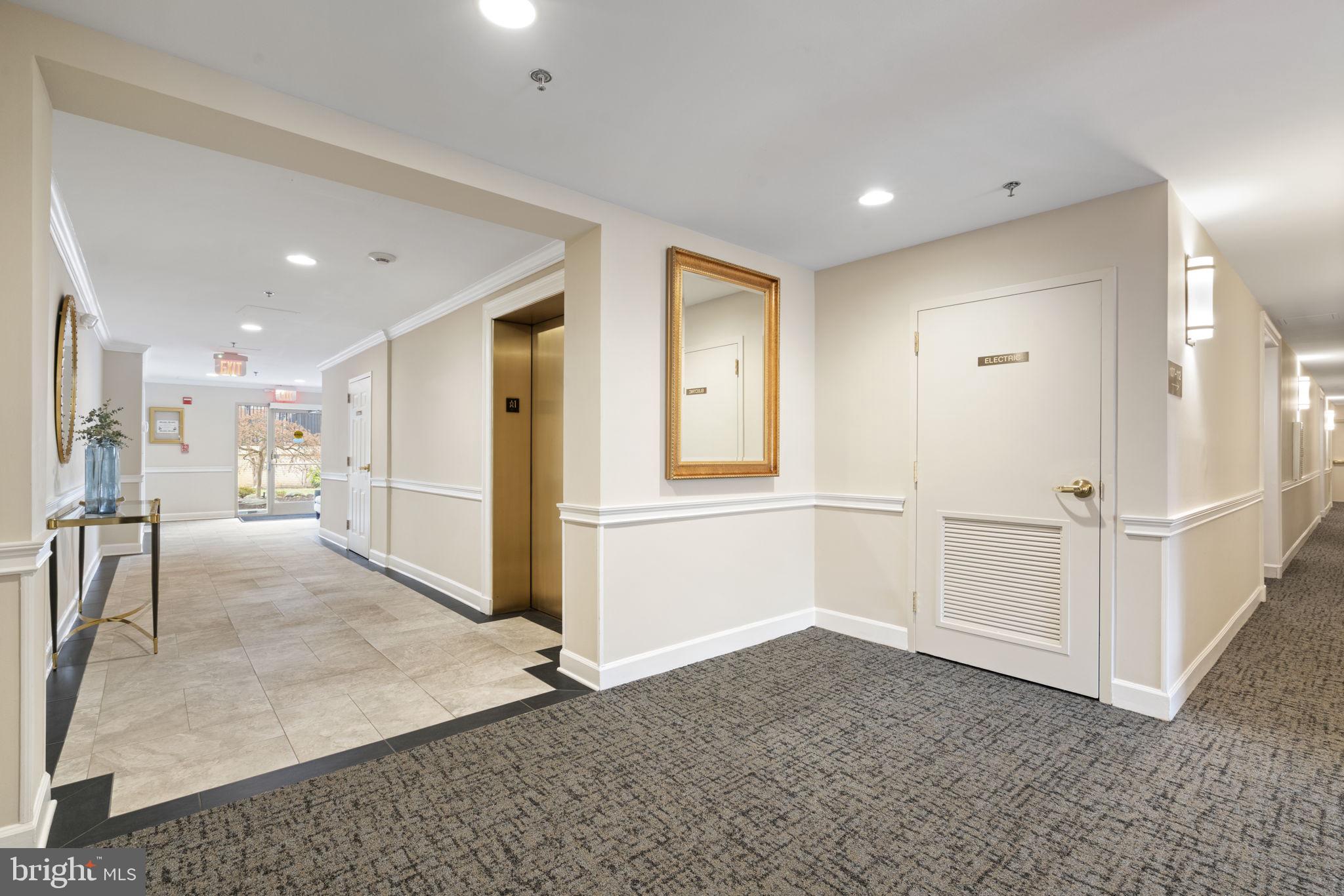 1860 Stratford Park Place, Unit 305 Reston, VA 20190 - Photo 7 of 35 Lobby with Elevator Access