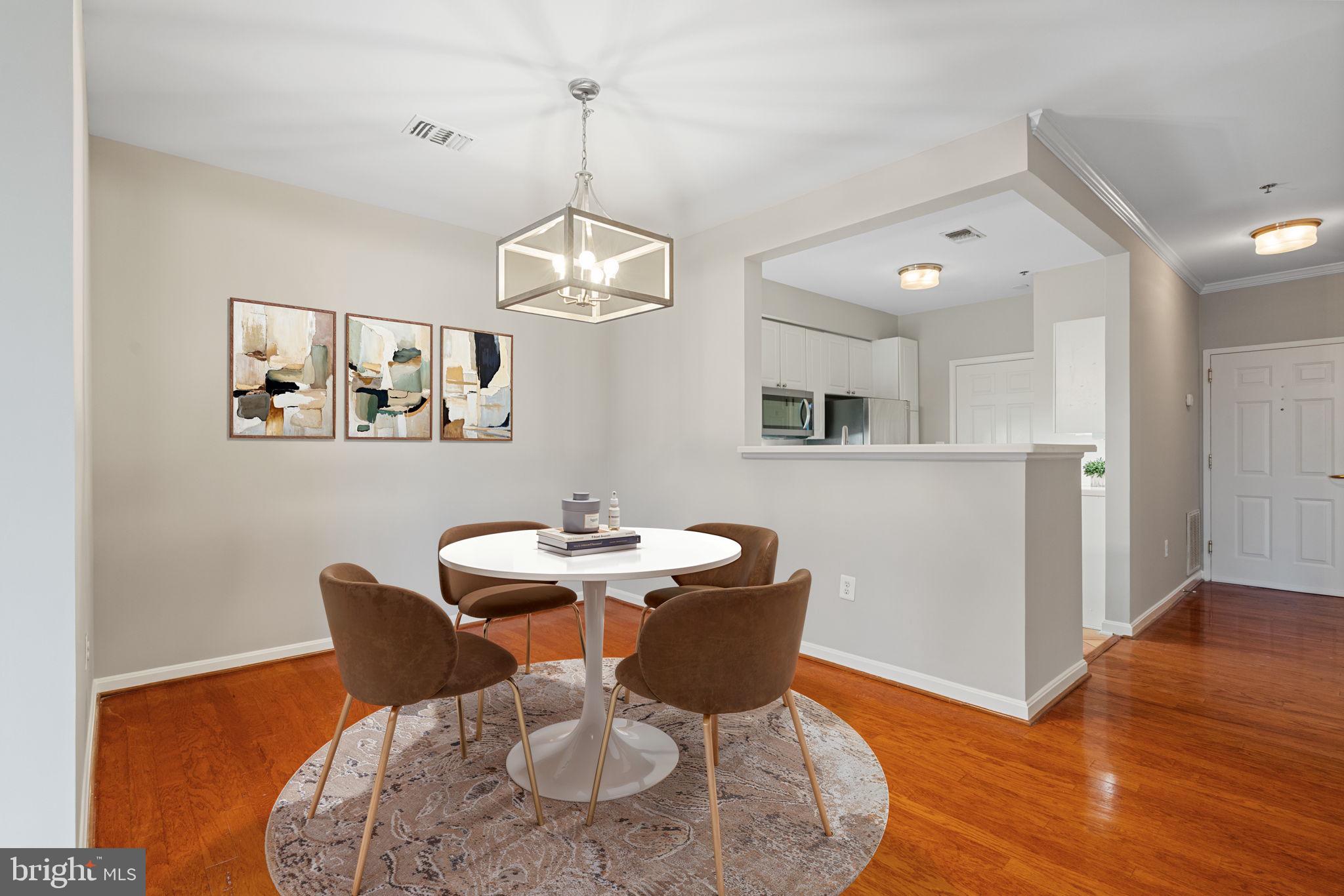 1860 Stratford Park Place, Unit 305 Reston, VA 20190 - Photo 9 of 35 Dining Room
Picture virtually staged